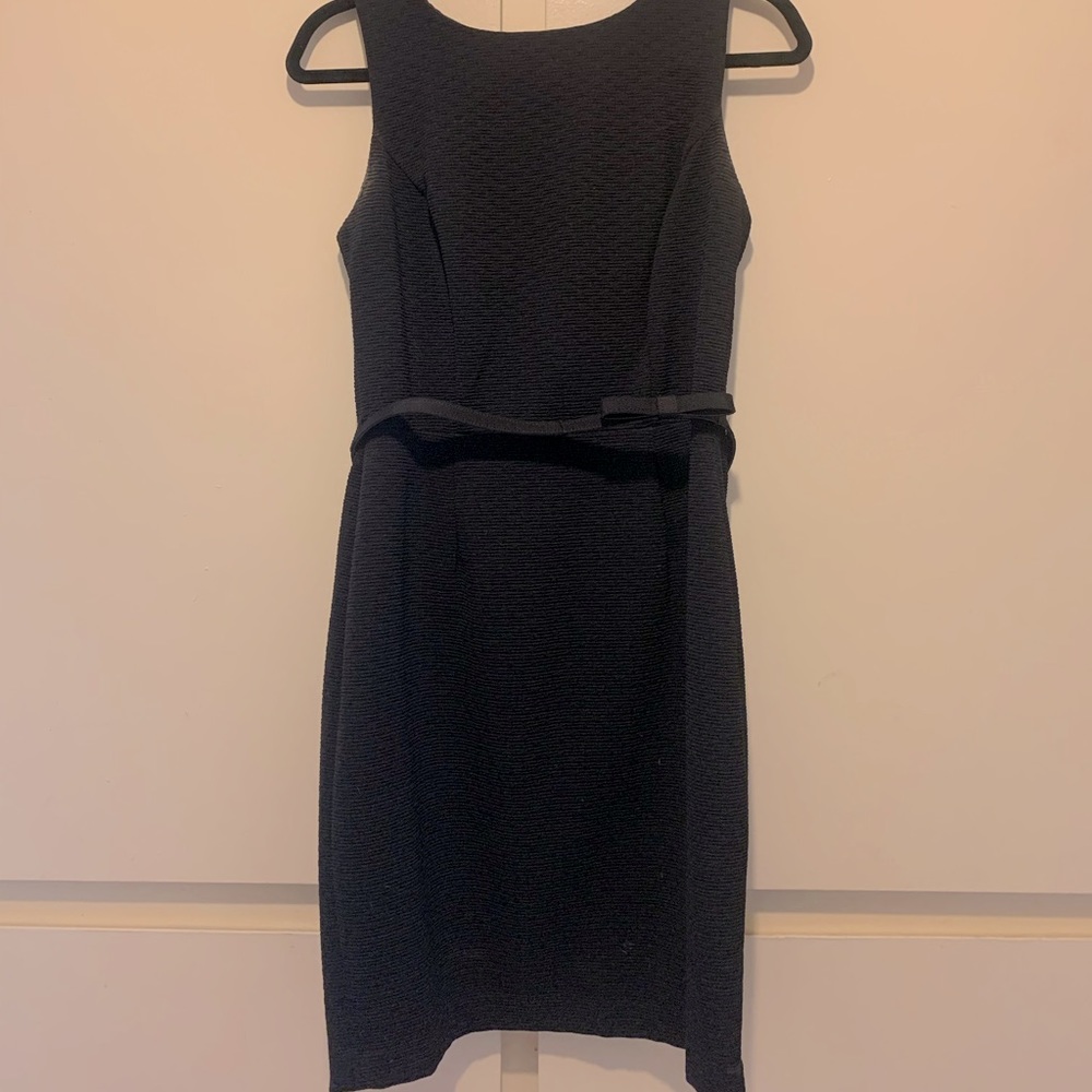 Women’s mid length dress. Cute detailed back!